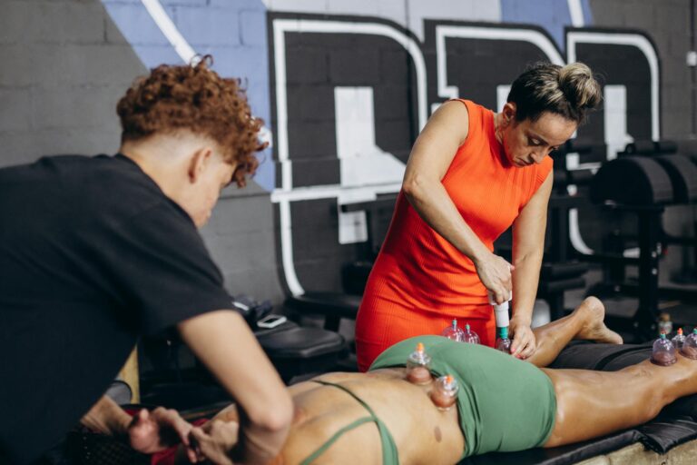 A woman is doing a massage on a man